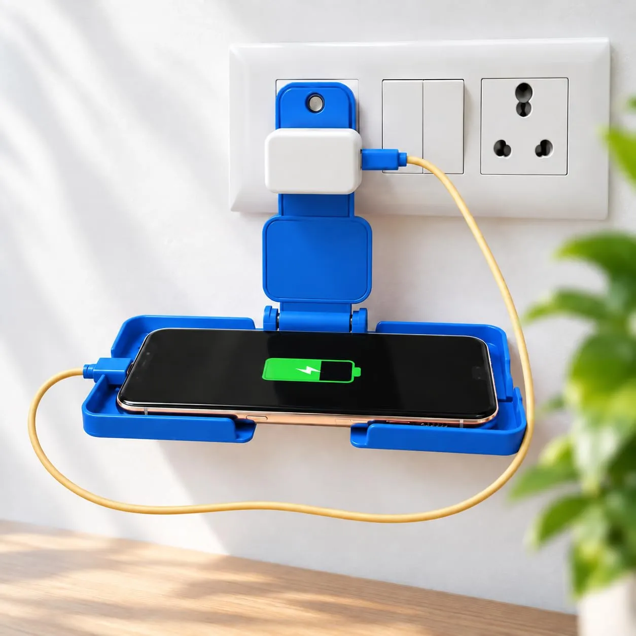 Keep your mobile phone organised near your charging point with this foldable mobile charging holder. The plastic tray features a centred three-pin upright, a folding hinge, perforated openings and raised edges. Use the holder to rest your phone while char