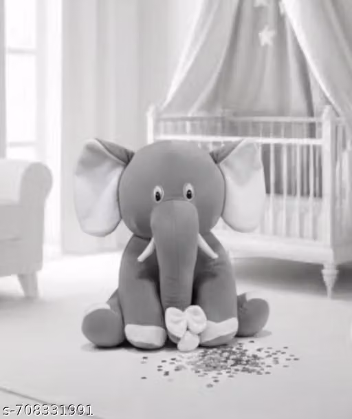 SEVEN HEAVEN give you This ultra-soft, grey elephant plush is designed for endless cuddles and imaginative play. With its oversized ears, friendly eyes, and a charming white bow, it’s the perfect companion for nursery decor or bedtime snuggles. Hand-stitc