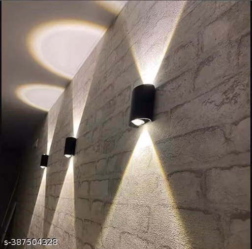 DECENT WALL LIGHT (1+1W) Warm White up down wall light is suitable for bedrooms, indoors, outdoors, and halls. It comes with a bulb and is perfect for home decoration. This wall lamp is waterproof with an IP-55 rating, making it weatherproof, rainproof, a