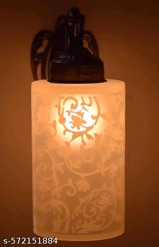 Get scintillate lighting in your home by decorating it with this amazing sconce shimmer wall lamp that will impress anyone with its modern design and eye-catching color. It is handcrafted by using high-quality brass and glass material that are known for t