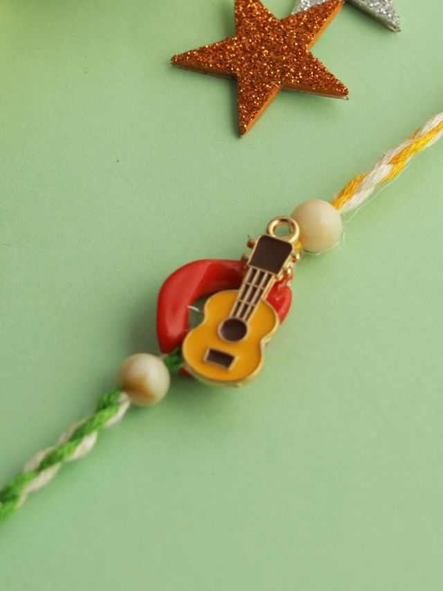 Cute Little Guitar Rakhi (Rakhi is included with Roli Chawal & Greetings Card)