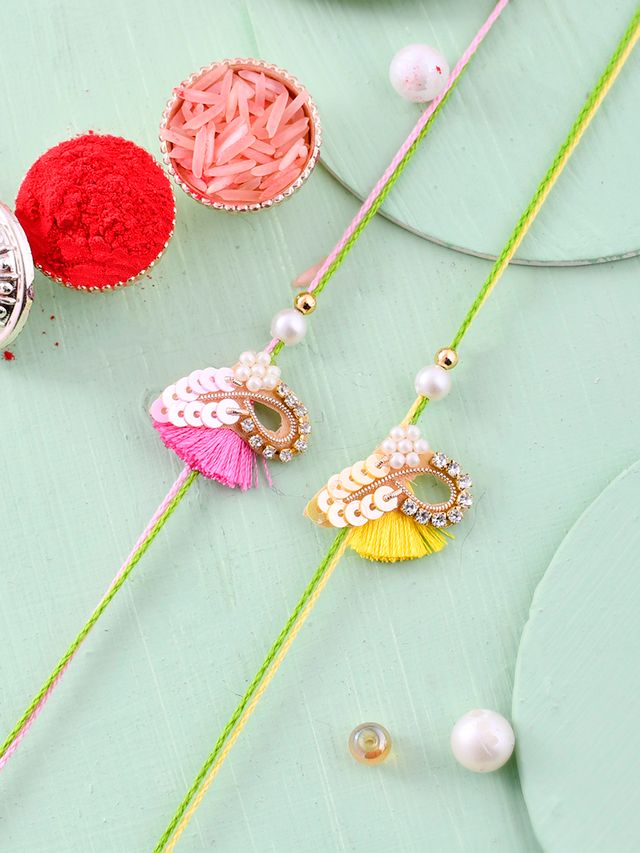 Sequenced Thread Work Set of 2 Rakhi (Rakhi is included with Roli Chawal & Greetings Card)