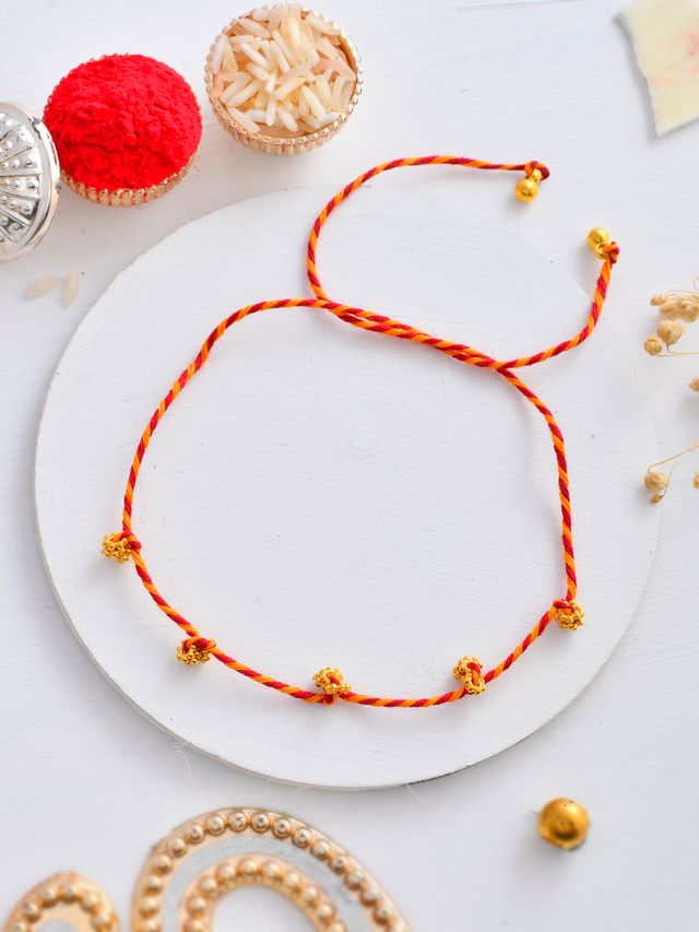 Ghungroo Braided Elegant Scarlet Red Rakhi (Rakhi is included with Roli Chawal & Greetings Card)