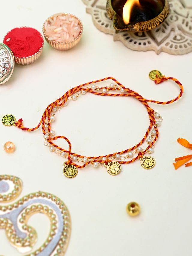 Pearl & Metal Coins Braided Elegant Rakhi with Pearls (Rakhi is included with Roli Chawal & Greetings Card)