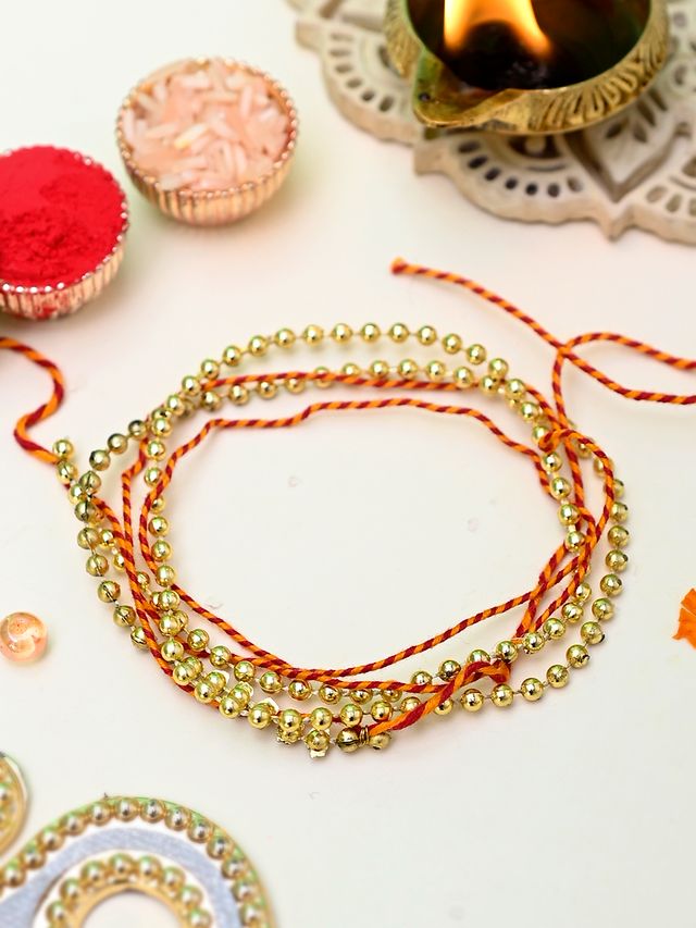 Elegant Pearl & Moli Braided Layered Rakhi (Rakhi is included with Roli Chawal & Greetings Card)