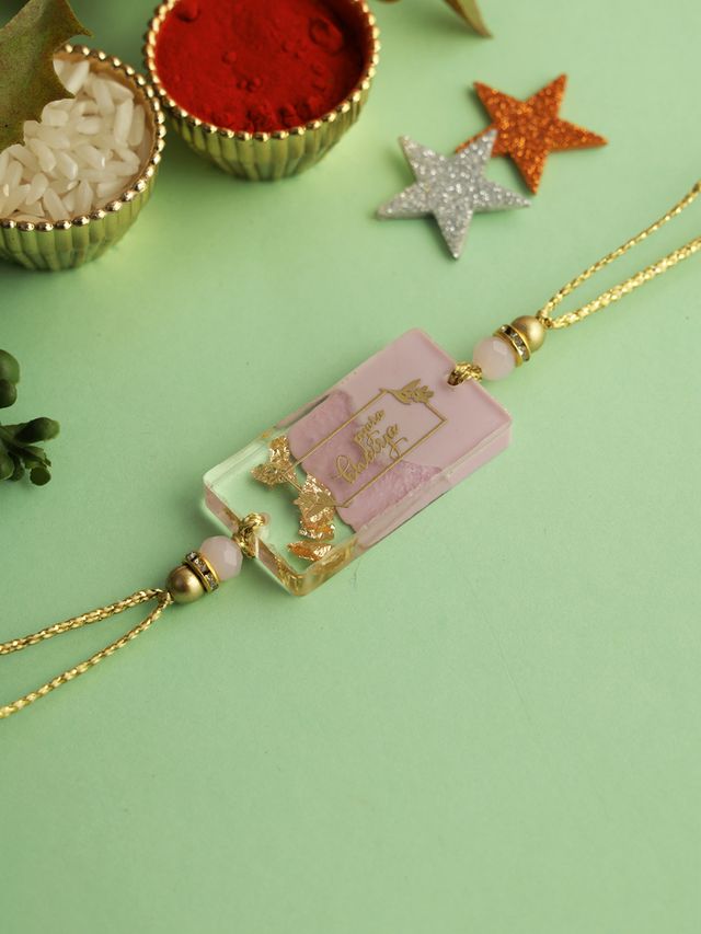 Cream Resin Designed Bhaiya Rakhi (Rakhi is included with Roli Chawal & Greetings Card)