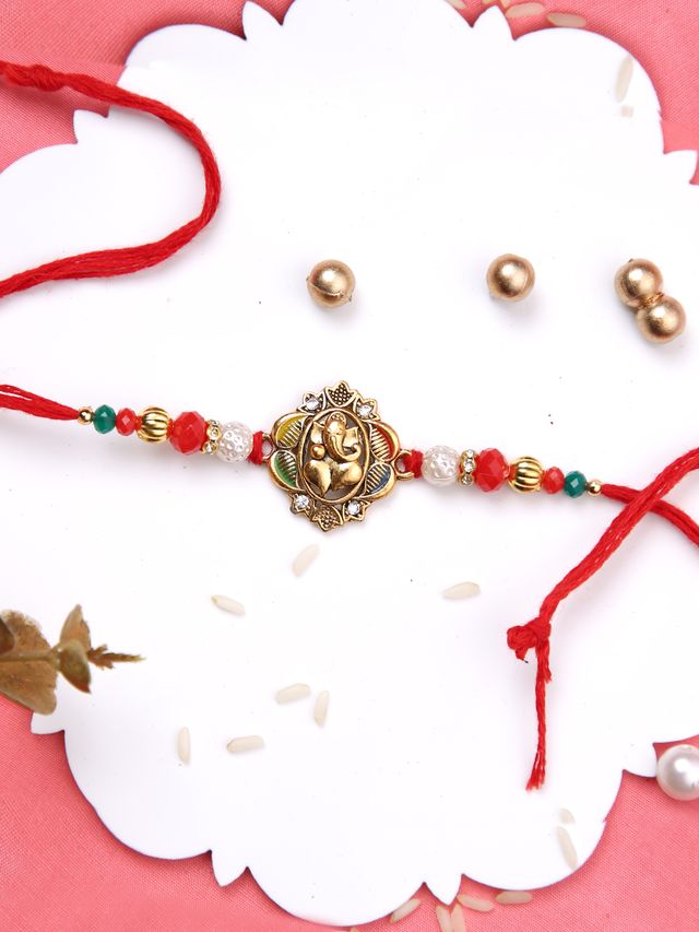 Divine Ganesha Gold & Rakhi Single Rakhi (Rakhi is included with Roli Chawal & Greetings Card)