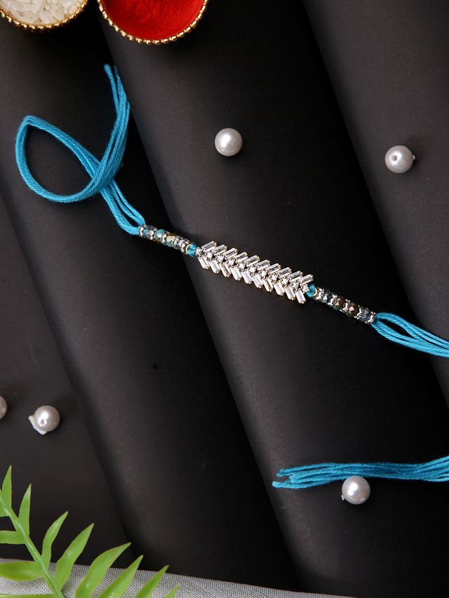 White Stone Studded Blue Multistrand Rakhi (Rakhi is included with Roli Chawal & Greetings Card)