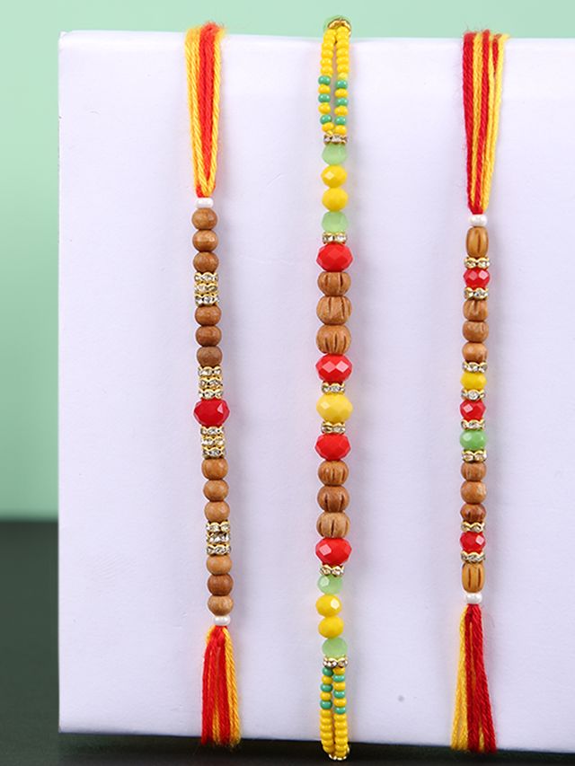 Brown & Red Beaded Set of 3 Rakhi (Rakhi is included with Roli Chawal & Greetings Card)