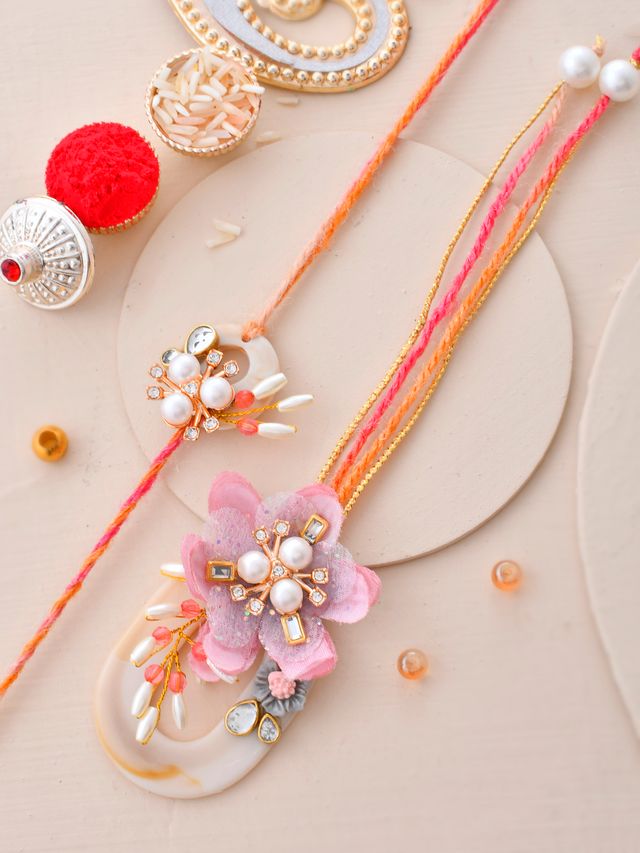 Radiant Flora & Pearl Crafted Bhaiya Bhabhi Set (Rakhi is included with Roli Chawal & Greetings Card)