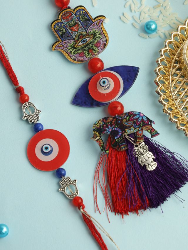 Red & Blue Evil Eye and Elephant Combo Bhaiya Bhabhi Rakhi (Rakhi is included with Roli Chawal & Greetings Card)