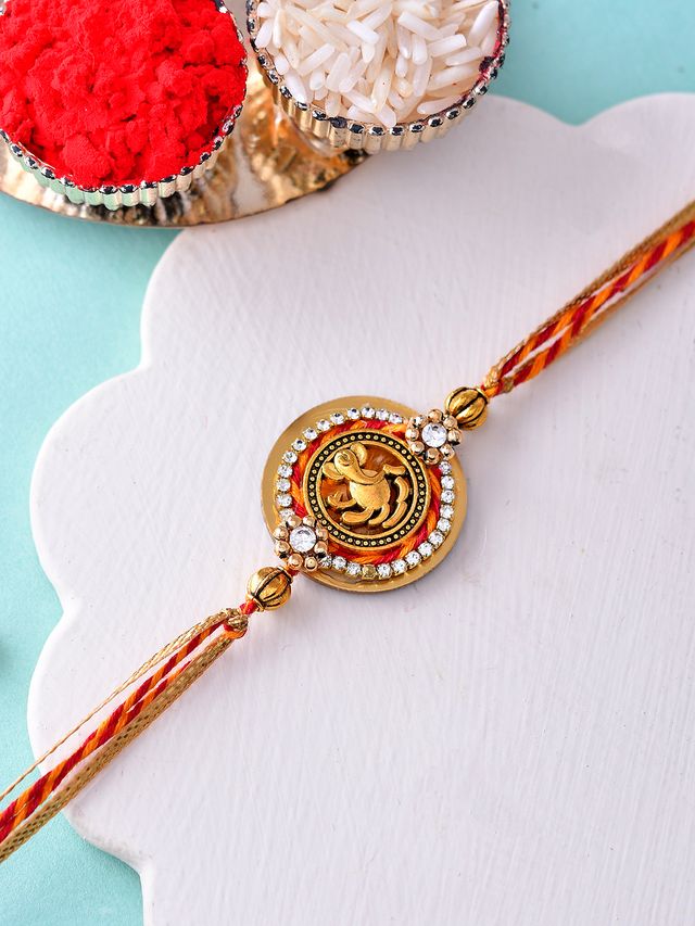 Divine Vighnaharta Rakhi with Circular Stone Frame (Rakhi is included with Roli Chawal & Greetings Card)