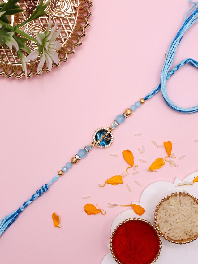 Handcrafted Floral-Inspired Rakhi with Blue Center Stone and Pastel Beads (Rakhi is included with Roli Chawal & Greetings Card)