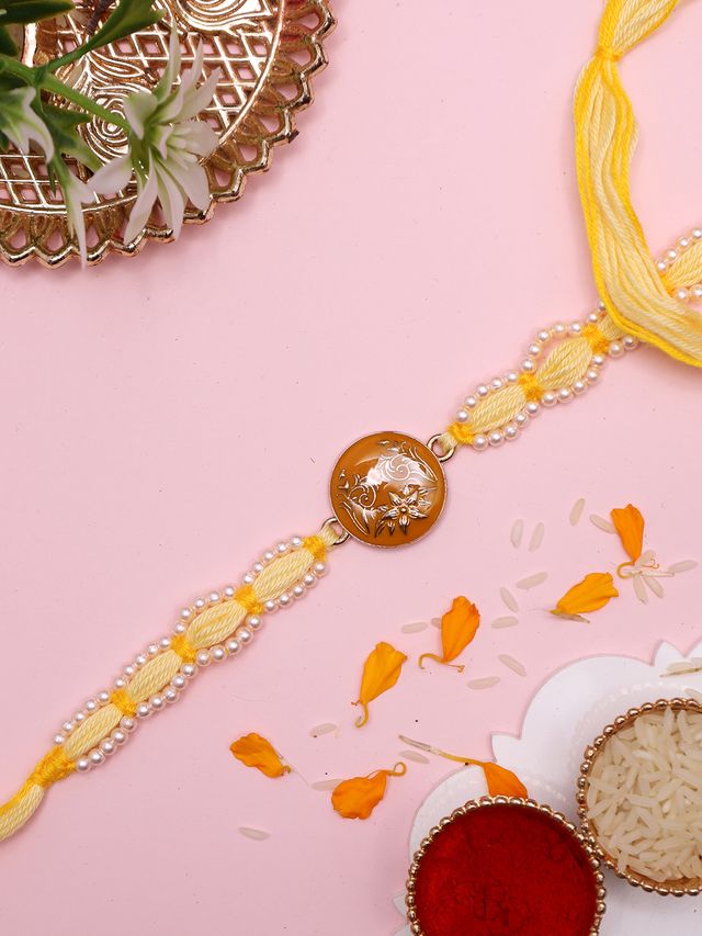 Handcrafted Yellow Thread Rakhi with Intricate Floral Center Design (Rakhi is included with Roli Chawal & Greetings Card)