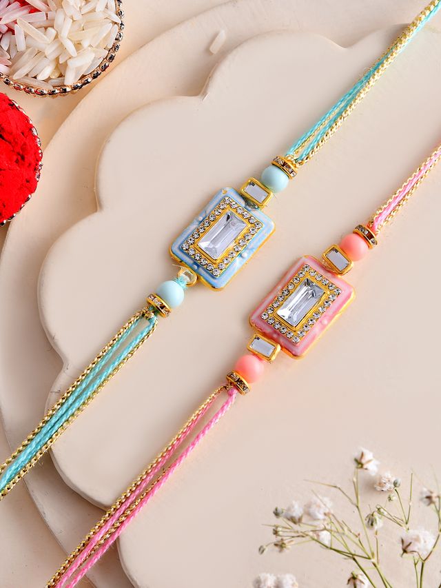 Subtle Sparkle Rakhi Duo with Soothing Pastel Charms (Rakhi is included with Roli Chawal & Greetings Card)