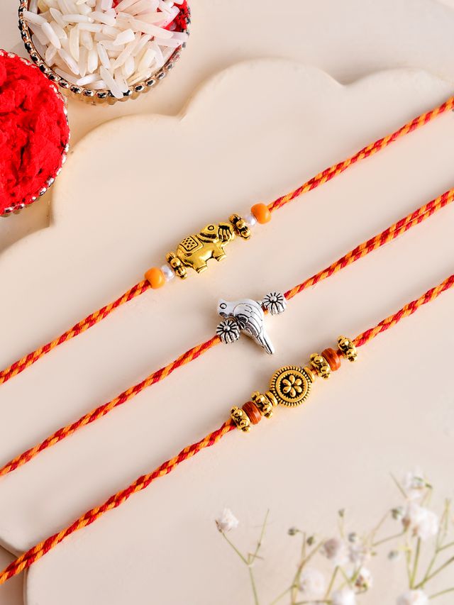 Festive Rakhi Set of 3 with Elephant Fish and Floral Motifs (Rakhi is included with Roli Chawal & Greetings Card)