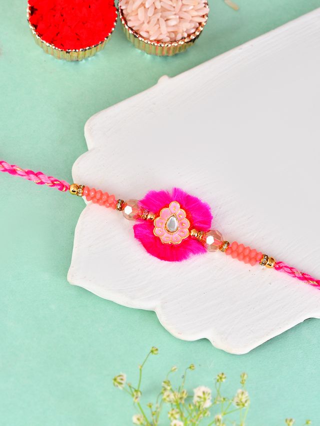 Pink Fancy Rakhi with Stones & Floral Design (Rakhi is included with Roli Chawal & Greetings Card)