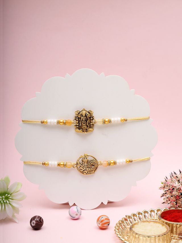 Antique God Symbol Rakhi Set with Divine Detailing and Pearl Beads (Rakhi is included with Roli Chawal & Greetings Card)