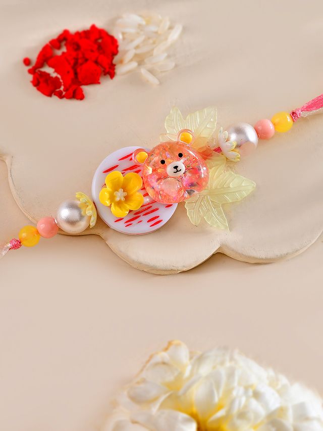 Adorable Teddy Bear Rakhi for Kids with Floral Detailing (Rakhi is included with Roli Chawal & Greetings Card)