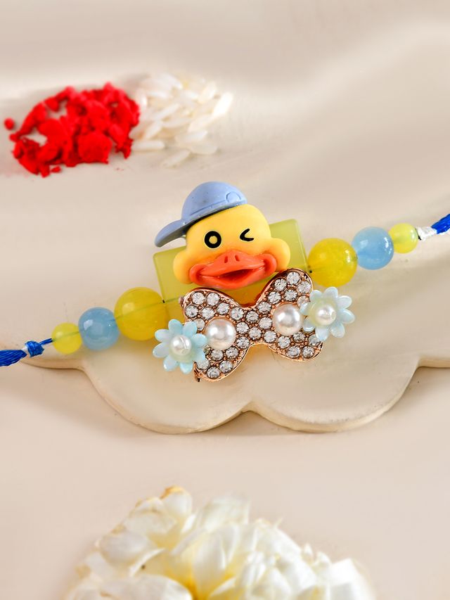 Winking Duck Kids Rakhi with Blue Cap and Crystal Bow Tie (Rakhi is included with Roli Chawal & Greetings Card)