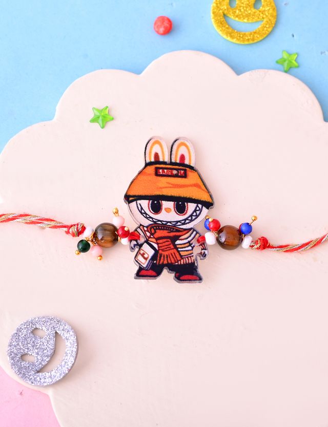 Orange-Hat Bunny Cartoon Bracelet with Beads (Rakhi is included with Roli Chawal & Greetings Card)