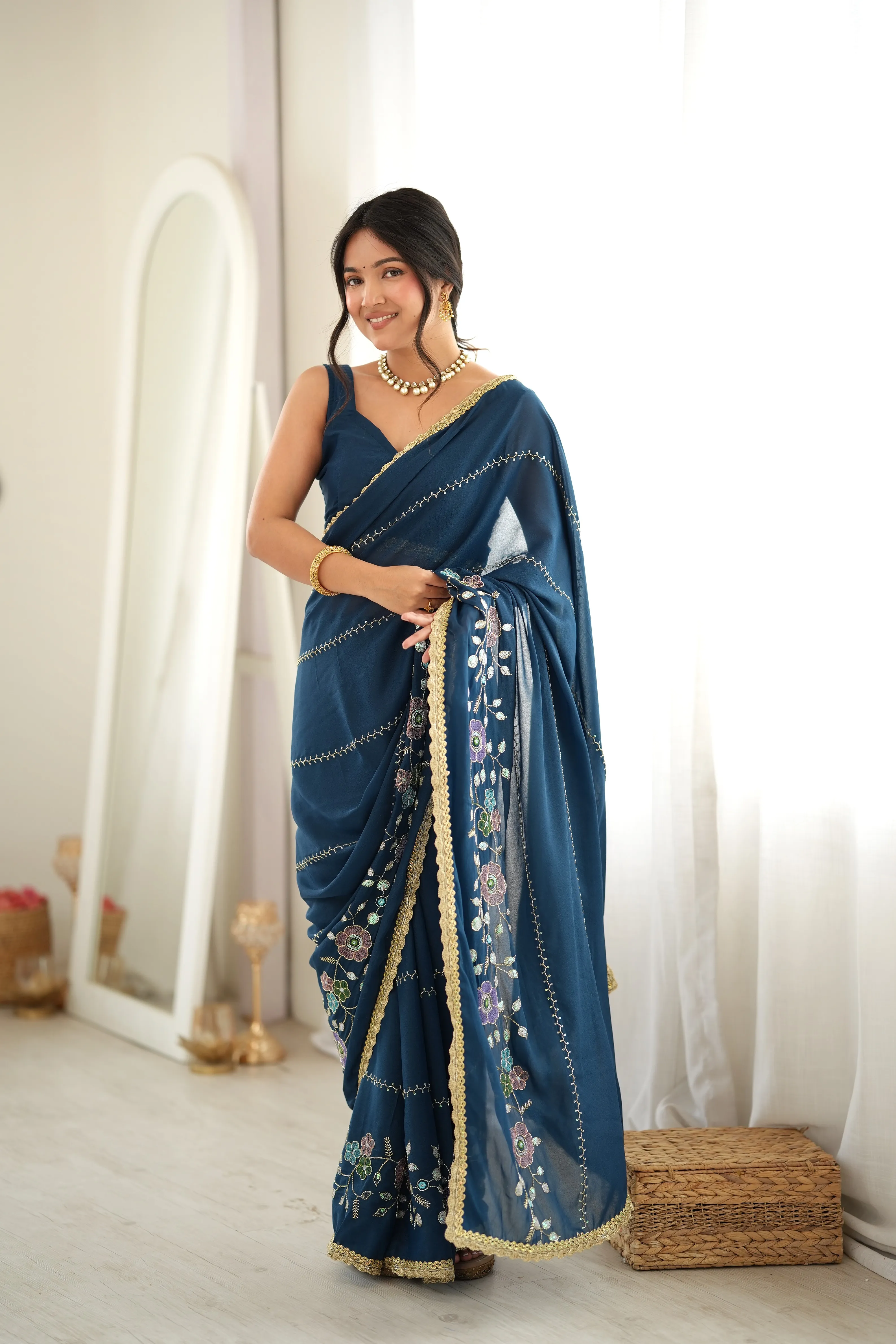 Panjari Teal Blue Floral Embroidered Georgette Saree with Scalloped Gold Border