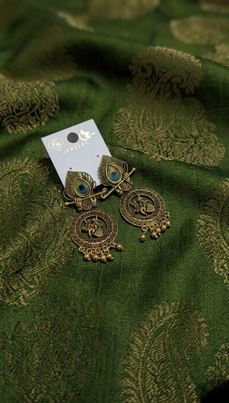 Blisskart Stylish Gold Oxidised Mor Pankh Bansuri Earrings | Religious Krishna Leela Design Jhumkas for Girls ( 1-pair )