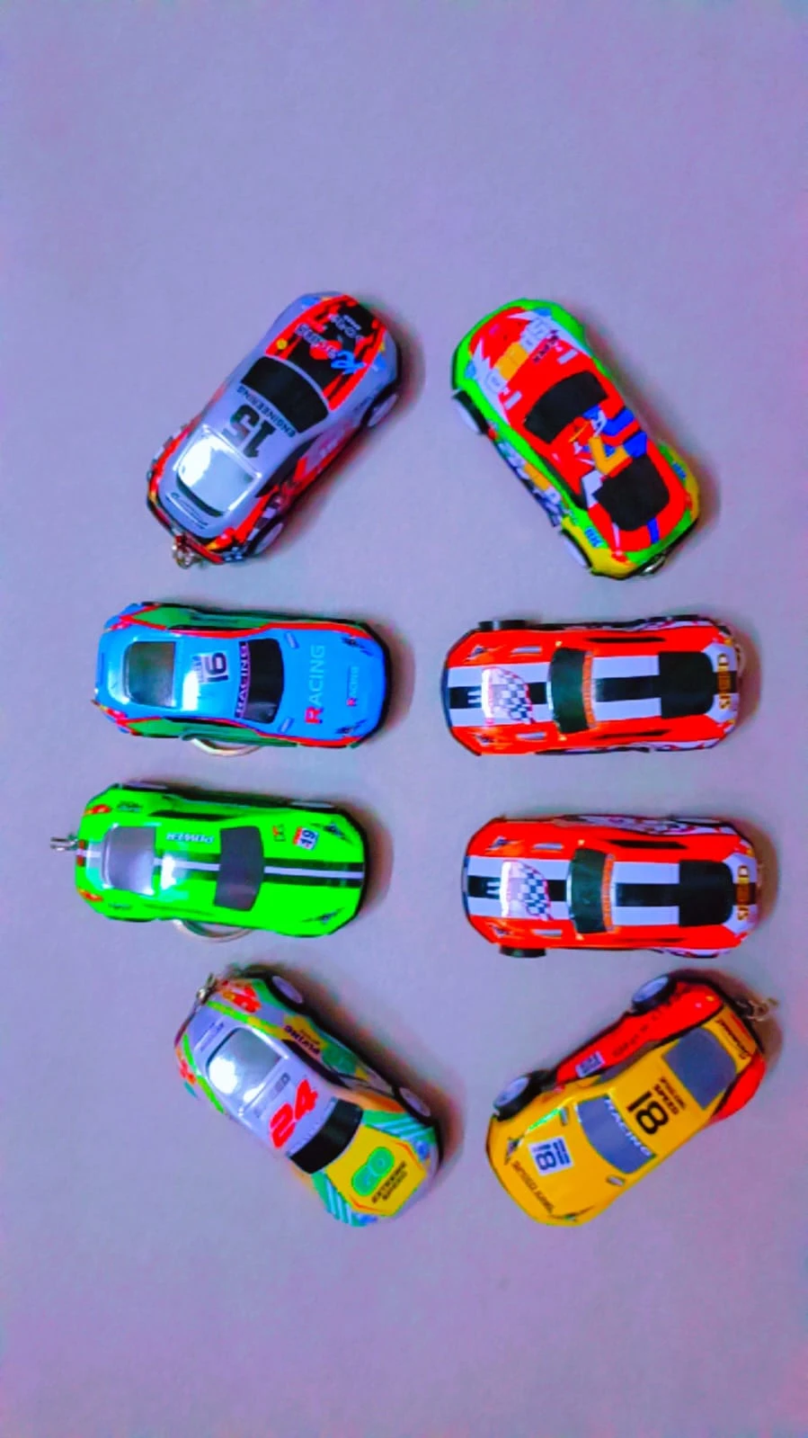 8 small toy racing cars